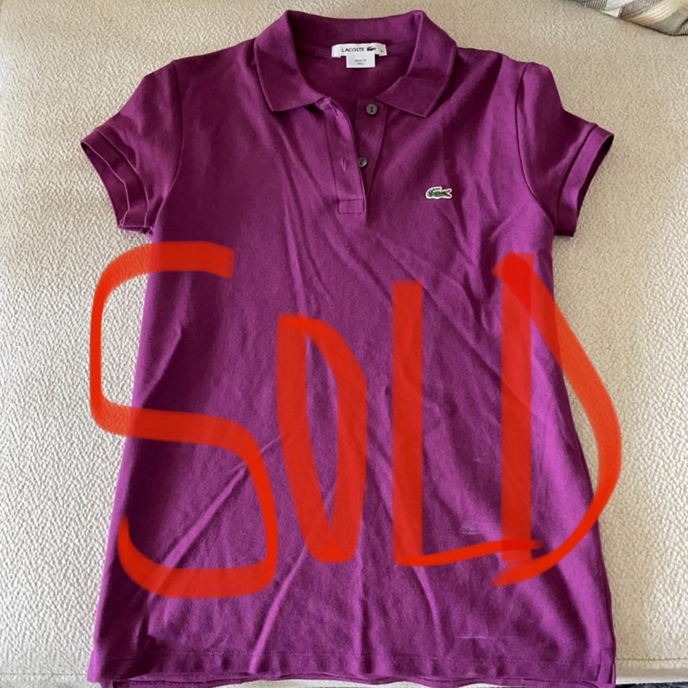 Lacoste purple polo.
